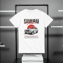 White t-shirt with Samurai Treasure graphic design on a black rack against a gray background