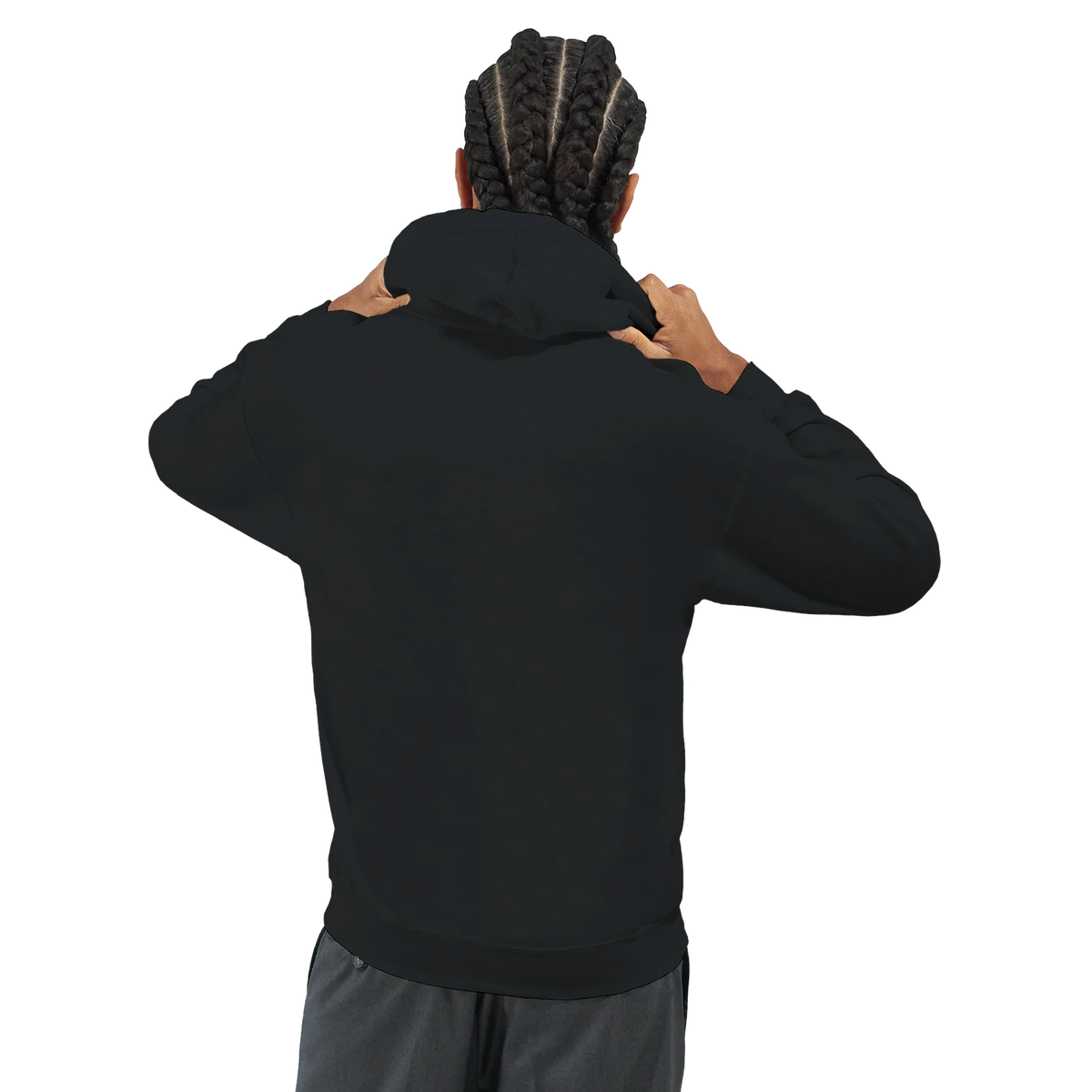 Man with braids adjusting the hood on a plain black streetwear pullover viewed from behind.