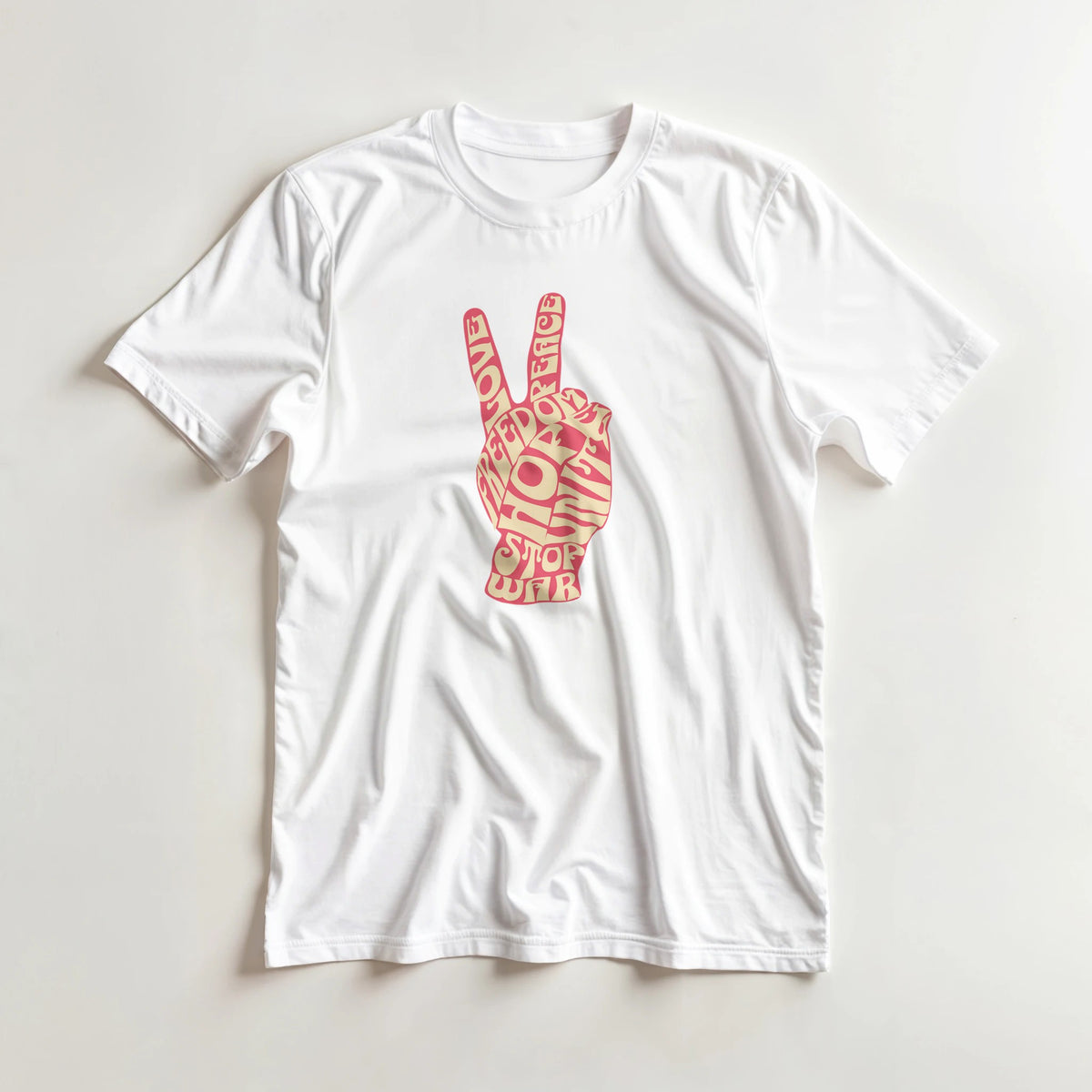 White women's graphic tee with pink peace sign hand design, short sleeves.