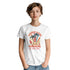 White cotton-blend Palm Trees graphic T-shirt on a model with a retro sunset and palm trees design.