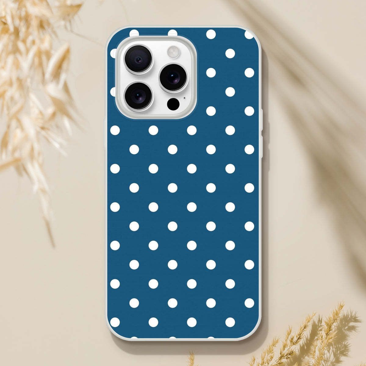 Retro navy blue iPhone case with white polka dots, featuring shock-absorbing TPU protection and a matte finish for 13-16 models.