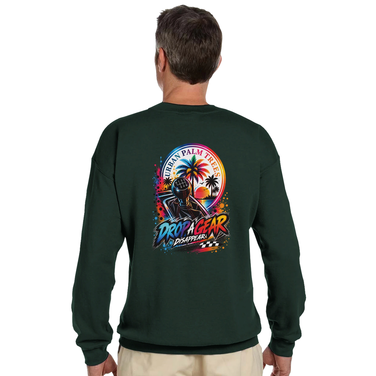 Dark green petrolhead sweatshirt featuring a colorful back graphic with a manual gear stick, palm trees, and Drop A Gear text.
