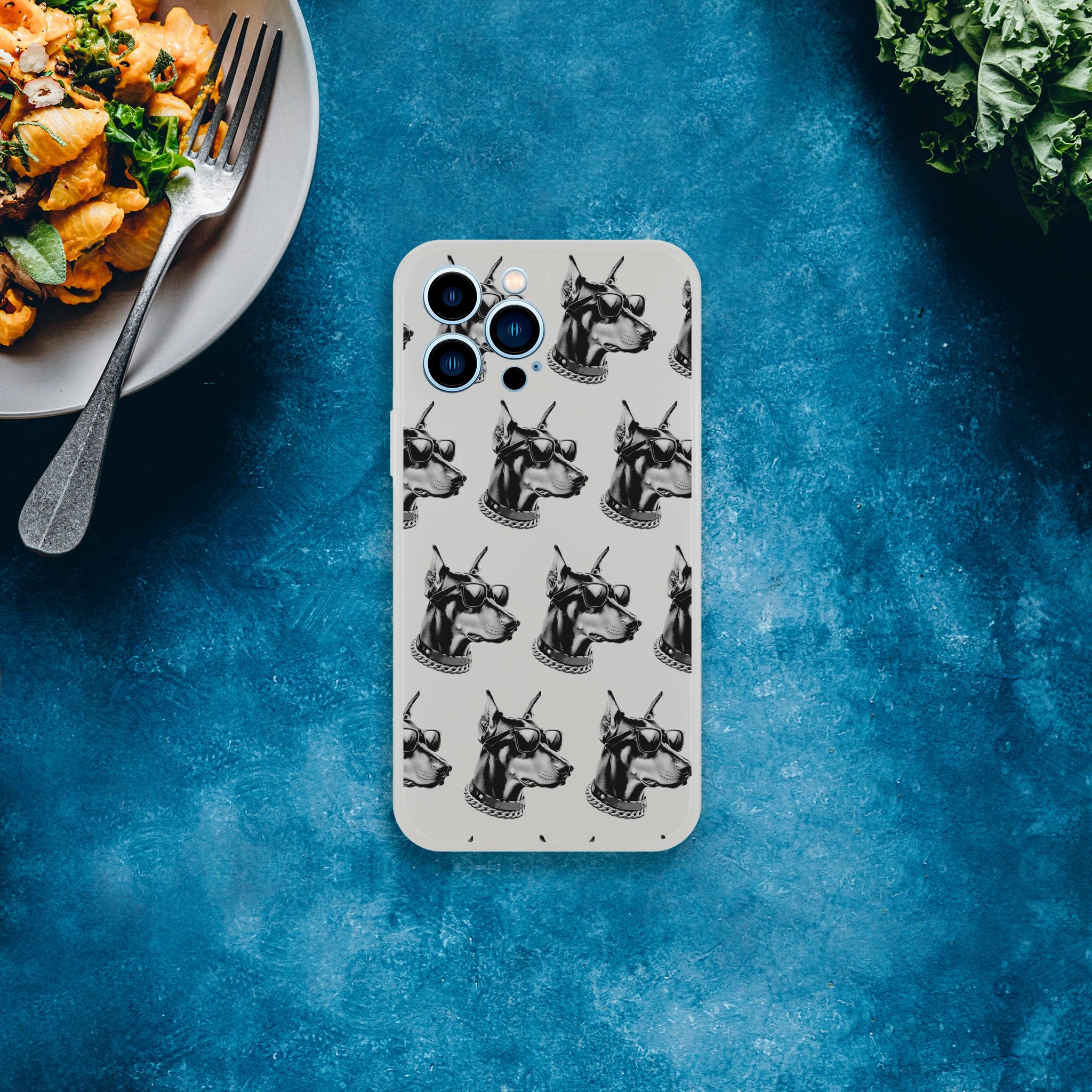 Gangster Dog slim protective case for iPhone 13-16 with frosty transparent texture and repeating dog heads pattern