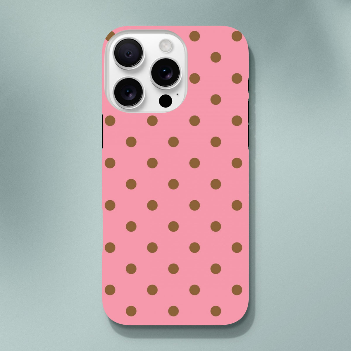 Pink & brown polka dot tough iPhone case with cute glossy finish and shock-absorbing protection for daily use.
