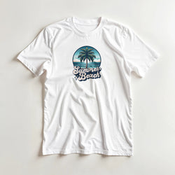 White women's graphic tee with circular tropical beach scene, palm tree, and 'Summer Beach' text.