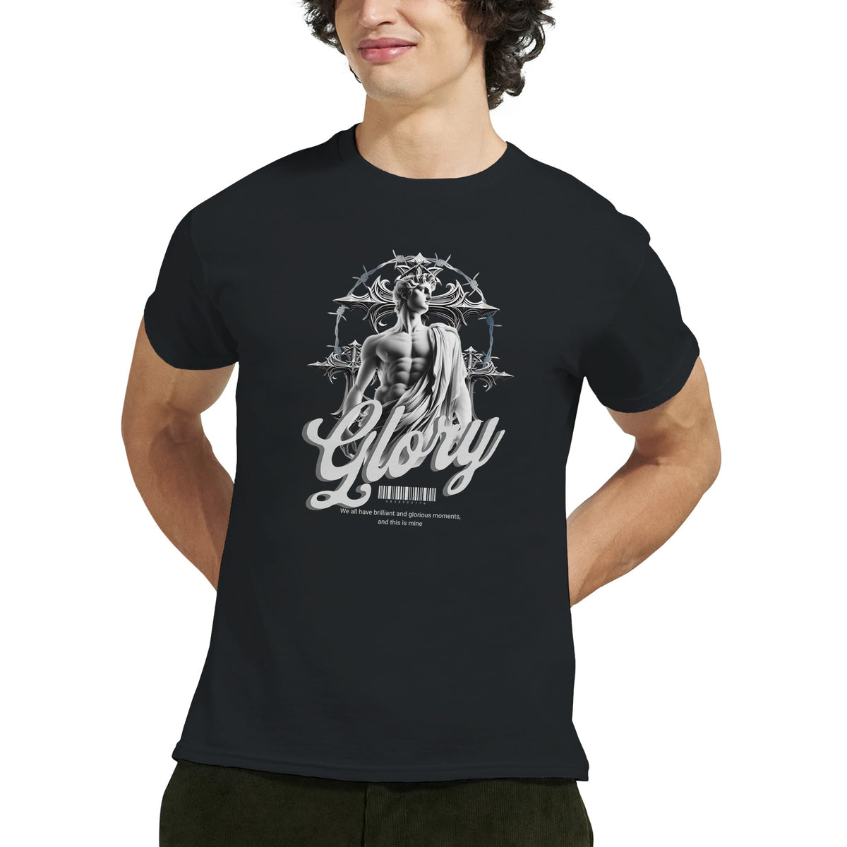 Male model wearing a black Gothic Glory graphic T-shirt with a white statue and Glory script.