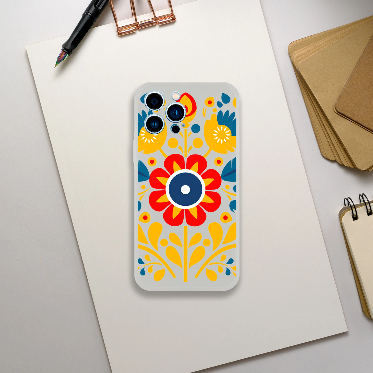 Floral slim protective case for iPhone 13–16 with frosty transparent finish and bold red, yellow, blue flowers.