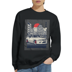 Car Jumper JDM Sweatshirt black crewneck with white sports car graphic in urban Japanese city under a red sun.