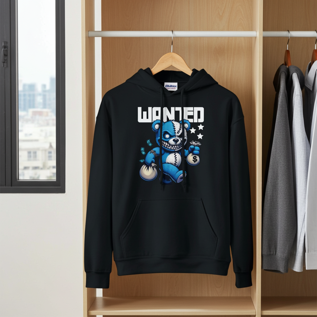 Black hoodie with a blue bear graphic and 'WANTED' text on a wooden rack.