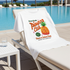 White T-Shirt with Pineco Club logo on a lounge chair by a pool