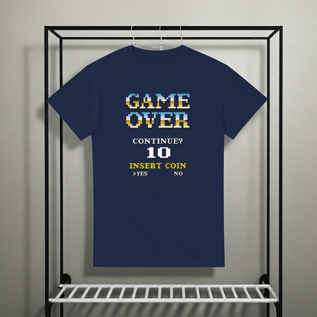 Navy blue t-shirt with retro video game text design on a rack.