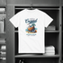 White t-shirt with coconut graphic and text on a hanger in a wardrobe.