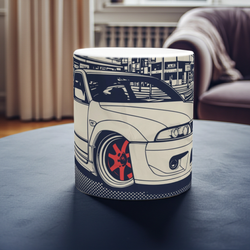 White mug with car design on a dark surface
