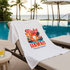 White T-Shirt with 'Aloha Hawaii Paradise Island' design on a lounge chair by a poolside.