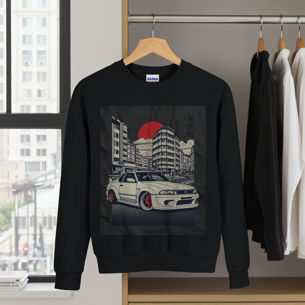 Black sweatshirt with car graphic on a hanger in a room with a cityscape view.